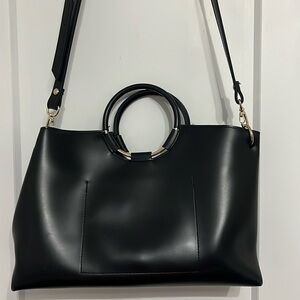 Cross body leather tote bag with round gold handle. Made in South Korea